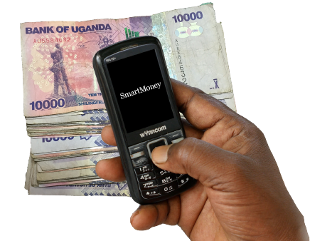 Hand holding SmartMoney mobile phone over money